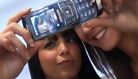 Slutty duo take snapshots of each other and rub their pussies on the floor