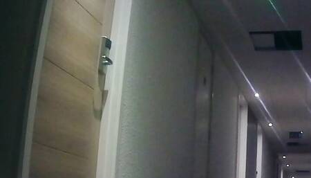 Hotel walk almost naked except for stockings and high heels