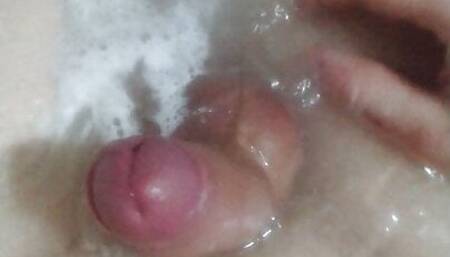 Playing with my cock in hot tub.