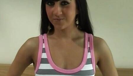 Stunning babe shows off her red toy