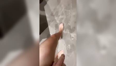 Naked men in public bathroom