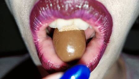 chewing and eating sweet chocolate