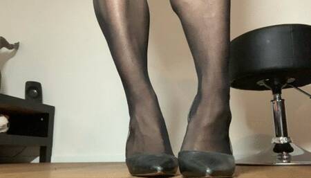 muscle legs in black pantyhose