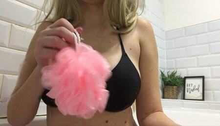 Shaving armpits in a bubble bath