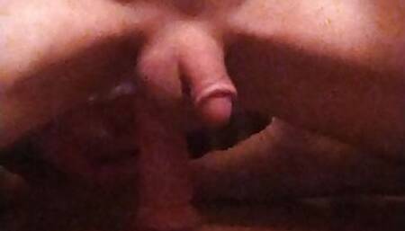 Small penis jiggles riding 10 inch dildo
