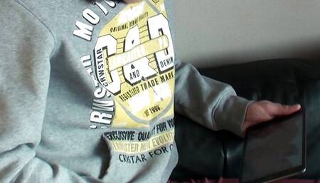 Cute gay guy passes the time with erotic masturbation until he comes to cum