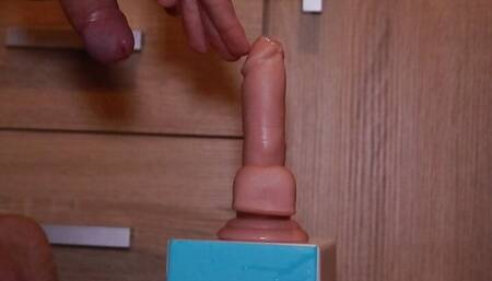 Dildo riding with a wet cock