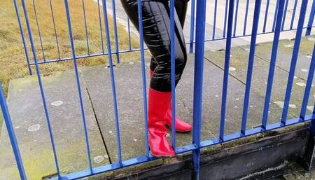 Black latex and red rubber boots