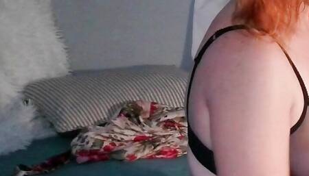 Redhead MILF using huge dildo