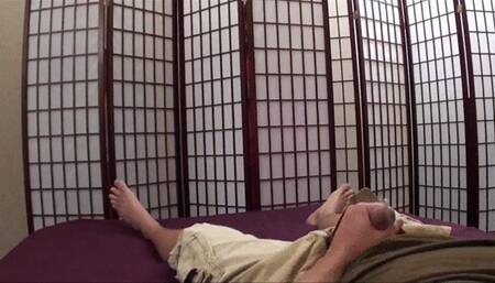 A sexy two girl footjob on the bed!