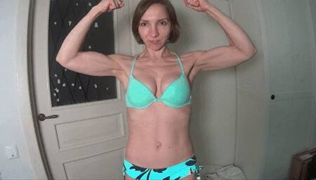 Muscles posing in bright bikini 3