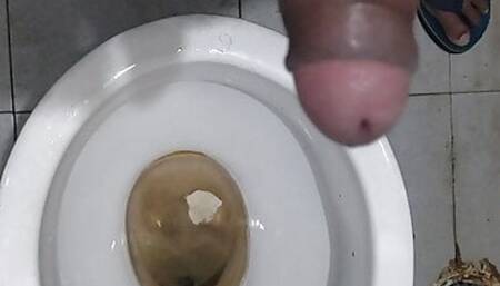 A guys masturbate penis in the bathroom