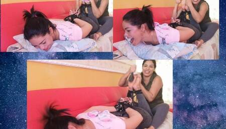 Barbara is tickled  in hogtie position