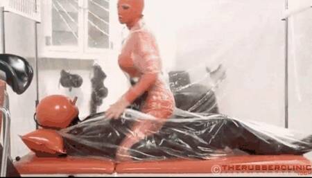 The latex slut in oxygen tent and plastic piss enclosure - Pissing and fucking