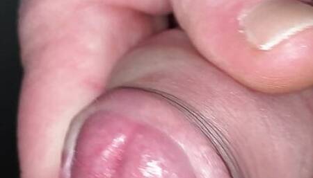 Close up edging tight foreskin with big cockhead