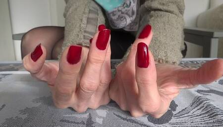 Long and dark red fingernails