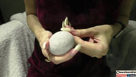 I sharpen my claws on a stone that I found on the beach