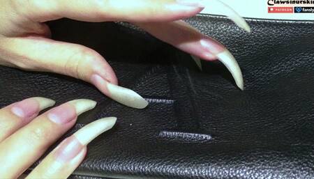 Sharp nails scratching leather bag 2