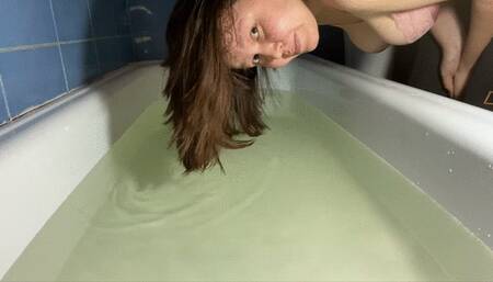 Hair wash and holding breath in tub and basin