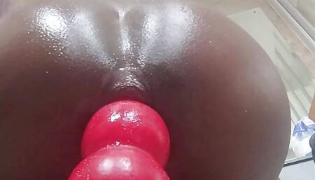 Oiled ass Stretched on Red Dildo
