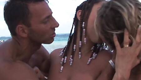 Threesome on the beach, in a fantastic island