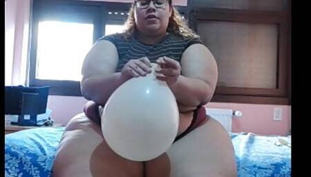 bbw pops balloons with her legs
