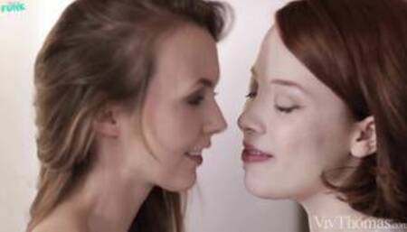 Sia S and Lottie M in a kitchen in a lesbian scene together