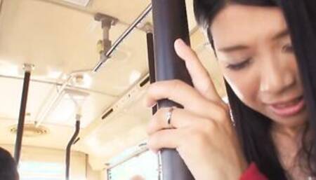 Big Boobed Aimi Nagano is banged inside a bus gang bang