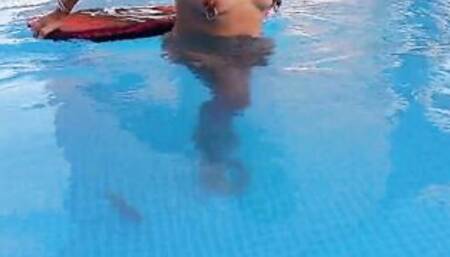 nippleringlover turned on MILF swimming naked inside pool watch through pierced