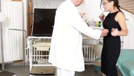 Older Emily Devine examined and made to cum into gyno