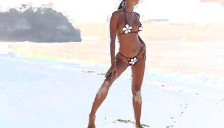 Exotic Beauty, Putri Cinta, taking off a micro bikini and