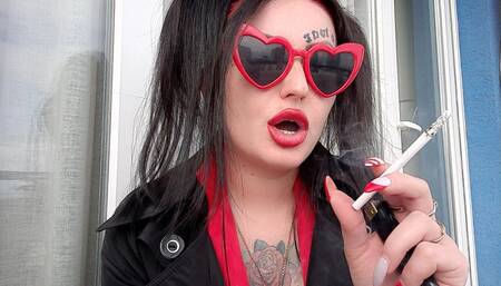 Sexy smoking fetish from Dominatrix Nika. Mistress smokes 2 cigarettes and blows smoke in your face. Sexy red lips