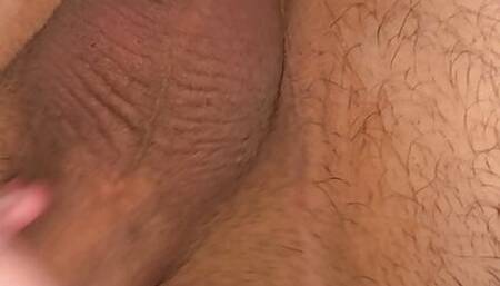 Fingers his ass