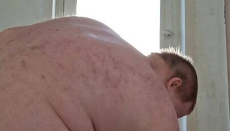 Fat boy takes a shower