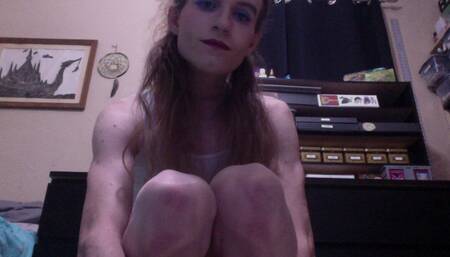 Sabrina Skye bounces up and down on a dildo while caged up.