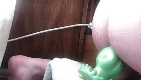 Sissy bouncing on huge dildo