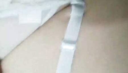 caressing his wife with his hands