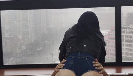 Hottie fucking in the window for everyone to watch