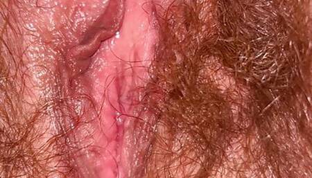 Sara spreads her hairy pussy