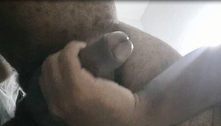 intimate moment of a man and his black dick