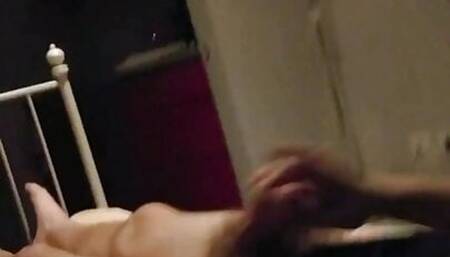 Wanking on bed watching porn