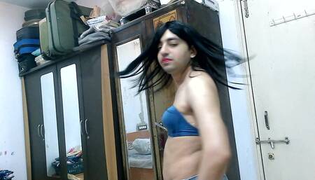 Behind the scene of Sweet Lollipop's video production in denim-backless bra.