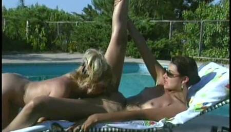 Sexy lesbian sluts pussy fucking by the pool