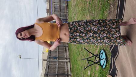 Getting naked in the backyard.  Showing off my pussy and tits.