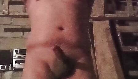 He fondles his very stiff cock and ends up savoring his seminal juices.