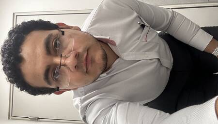 Mexican is jerking his cock at the office's bathroom