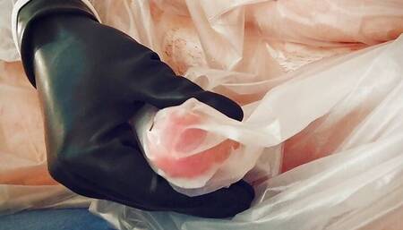 Getting hard while posing in plastic gown and latex gloves