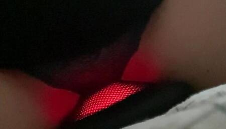 The bitch is jerking off her clit with a massager.
