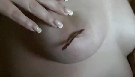 The whore put the clothespin on the nipple and works quietly.