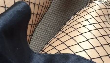 My legs on shiny glossy pantyhose and fishnet